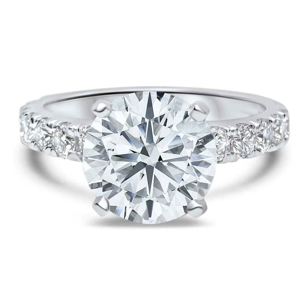 Front view of a 3.7 total carat round diamond engagement ring with a 4-prong setting, IGI certified F/VS2, in 14k white gold.