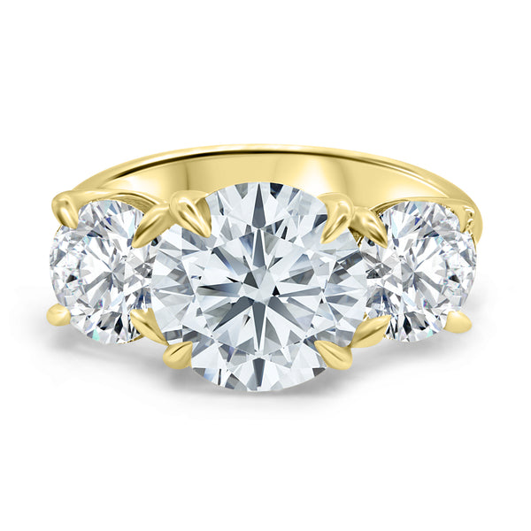 Front view of a 5 carat 3-stone round diamond engagement ring, IGI certified E/VS1, in 14k yellow gold.