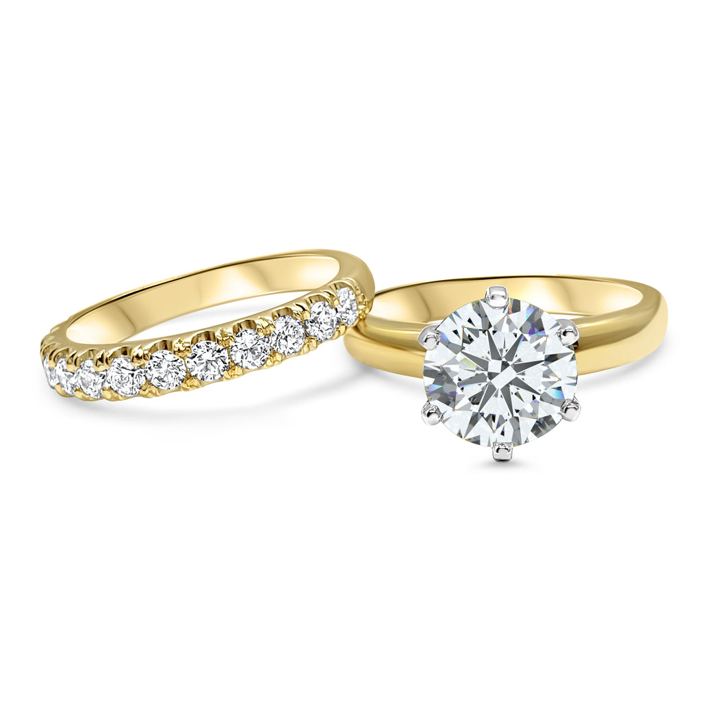 Front view of an IGI certified diamond bridal wedding set, featuring a 1, 2, or 3 carat round engagement ring and wedding band in 14k yellow gold.