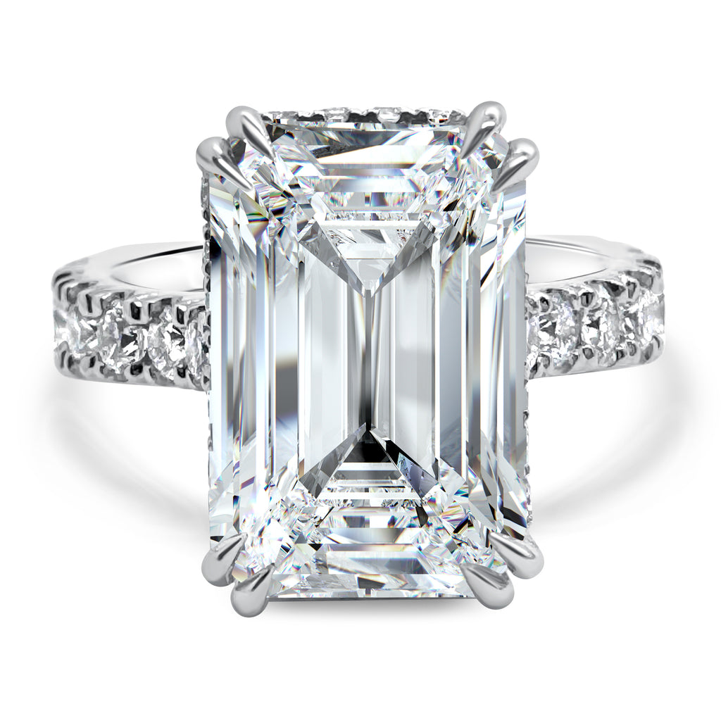 Front view of a Hidden Halo 10 carat emerald cut lab-grown diamond engagement ring with diamond accents, IGI certified G/VS2, in 14k white gold.